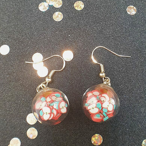 Glass ball earrings filled with FIMO clay fruit pieces available in a variety of different fruits