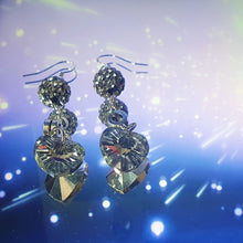 Load image into Gallery viewer, Silver glass faceted hearts with matching silver shamballa beads as a dangly set of earrings topped off with silver earring hooks 6.9 cm in length
